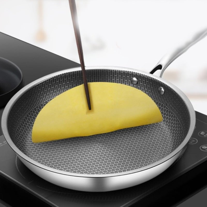 Stainless steel frying pan with non-stick coating for effortless cooking
