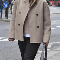 Trendy, loose-fitting jacket with button closure for women